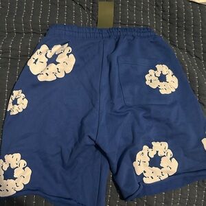 DENIM TEARS

The Cotton Wreath Sweat Shorts Royal Blue